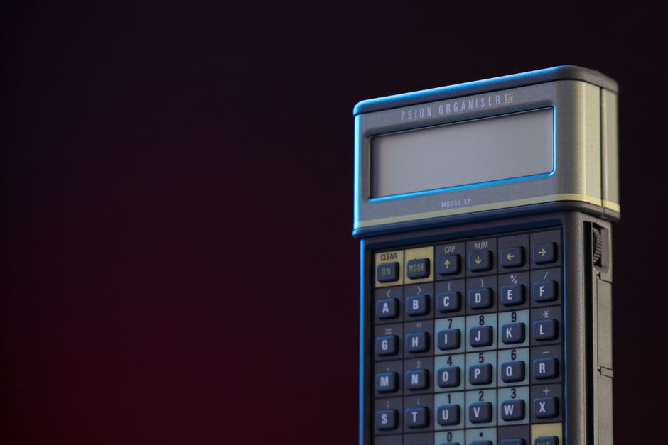 Close-up of a classic Psion Organiser II, showcasing retro electronic design.